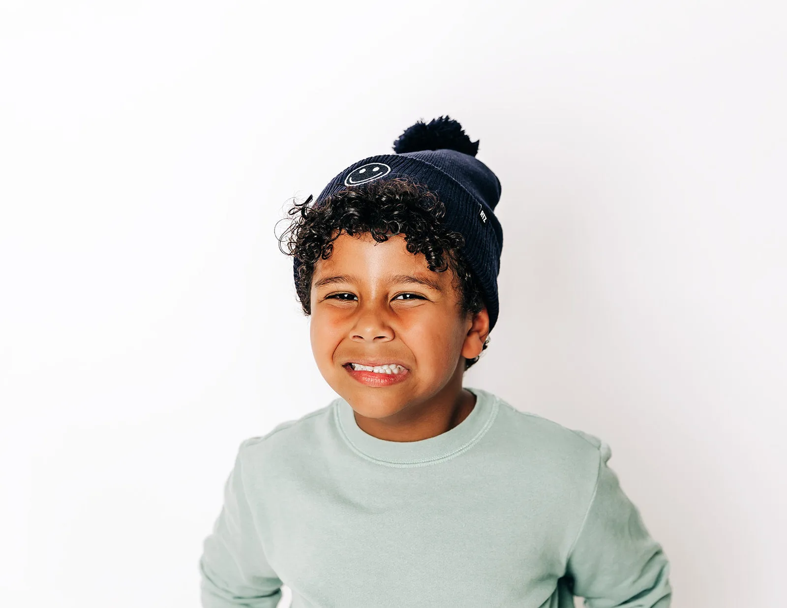 Navy Smiley Pom Pom Hat